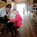 Rachel Ostach feeds a baby goat with her daughter Natalie, 5, both of Livonia, at Dominos Petting Farm on Monday, July 1, 2013. Melanie Maxwell | AnnArbor.com